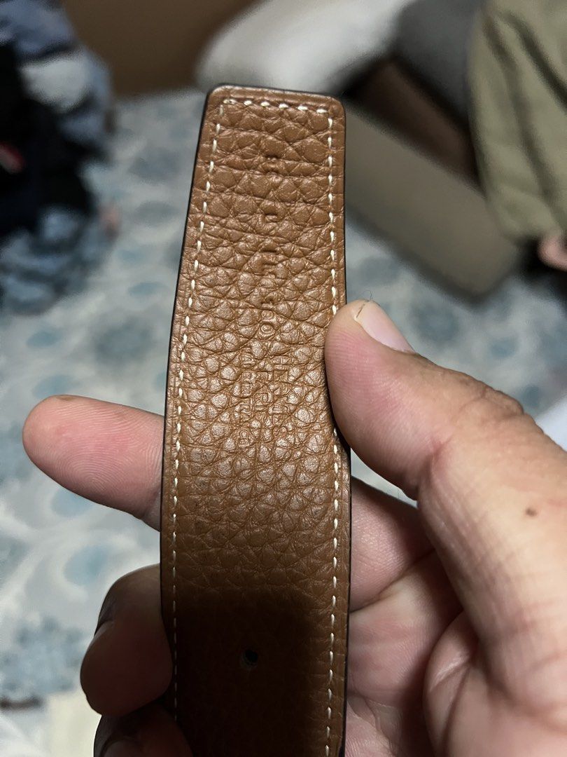 Hermes Reversible Belt with Gold Buckle (Category: Belts) located in Cavite. Submitted by budoy07 (Listing ID 1425122137, Image 3). Description: Hermes belt features a reversible design with a black exterior and a brown interior. Negotiable.