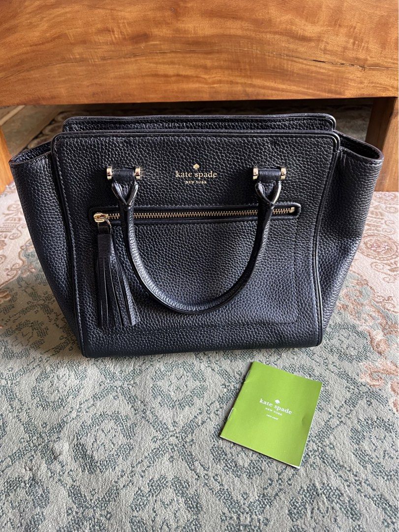 Kate Spade New York Black Leather Handbag (Category: Luxury Bags & Wallets) located in Taguig. Submitted by fullestcloset (Listing ID 1425098721, Image 1). Description: Only stored Never been used out. Bought 7 years ago. Has no issues ⭐️.