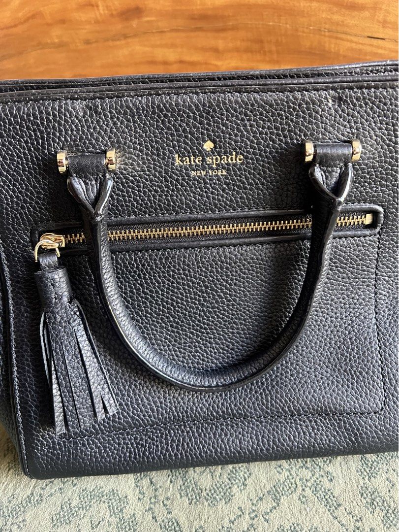 Kate Spade New York Black Leather Handbag (Category: Luxury Bags & Wallets) located in Taguig. Submitted by fullestcloset (Listing ID 1425098721, Image 2). Description: Only stored Never been used out. Bought 7 years ago. Has no issues ⭐️.
