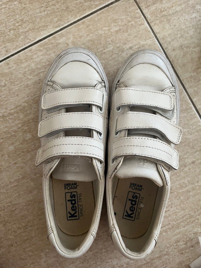 Keds White Sneakers with Velcro Straps (Category: Sneakers) located in Pasig City. Submitted by kimcbrl (Listing ID 1425092524, Image 1). Description: Size: US 6 Well used. Flaws in the photo.