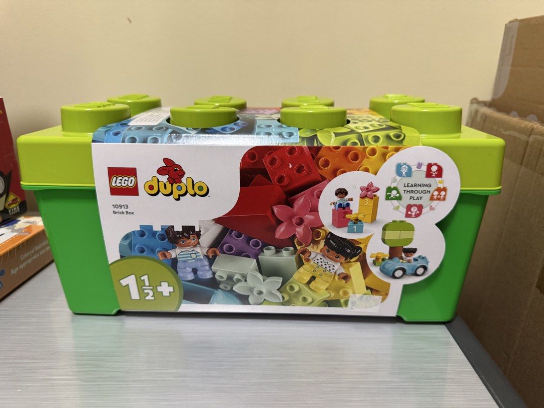 LEGO Duplo 10913 Brick Box (Category: Lego & Building Sets) located in San Juan City. Submitted by biancaong10 (Listing ID 1425194737, Image 1). Description: LEGO Duplo 10913 Brick Box. This set is designed for children aged 1 1/2 years and older. The box contains various colorful LEGO Duplo bricks and figures. It is a great set for learning through play. The box itself is green and designed to look like a large LEGO brick..