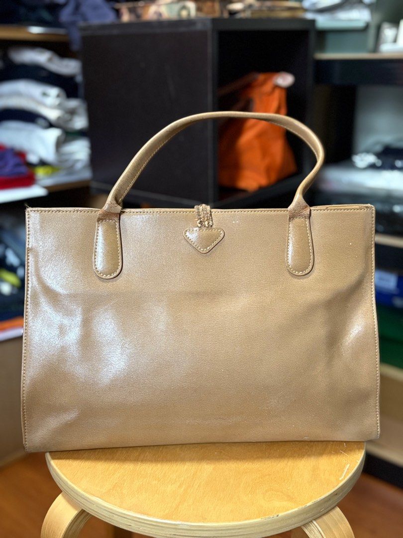 Longchamp Beige Bag (Category: Luxury Bags & Wallets) located in Quezon City. Submitted by se2ndlookph (Listing ID 1425160506, Image 2). Description: Longchamp beige bag with signs of wear and tear Please see pictures for details Location: Quezon City.