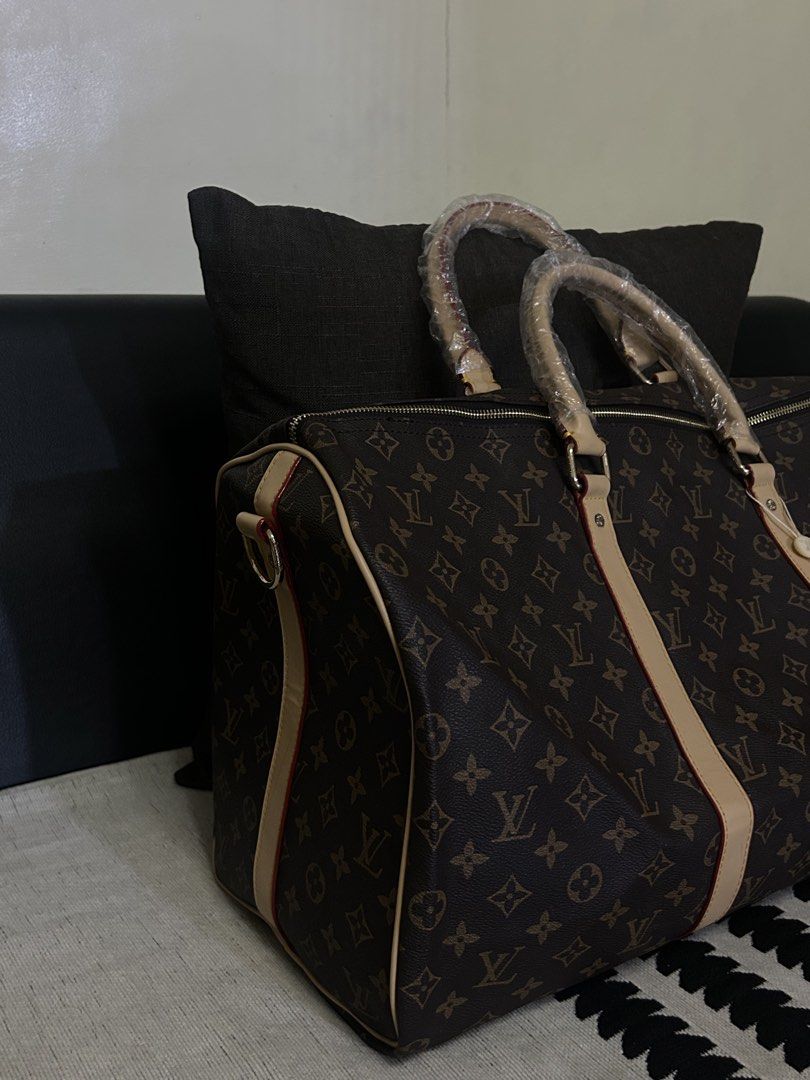Louis Vuitton Monogram Keepall Bandouliere 55 (Category: Luxury Bags & Wallets) located in Manila. Submitted by lharadrian67 (Listing ID 1425177597, Image 2). Description: check the last picture for the issue.