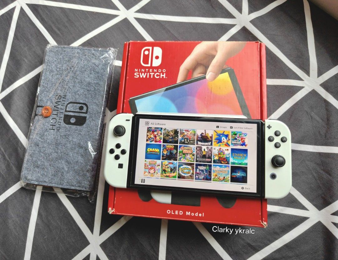 Nintendo Switch Oled White with Free Games (Category: Nintendo) located in Manila. Submitted by nswitchgear (Listing ID 1425124436, Image 1). Description: Nintendo Switch OLED with Free Games ₱10,999 FREE acess to my Paid games Legit purchase not Jailbreak. Used item but in Good/Best condition Can give 7 Days personal Warranty for peace of mind. -Doon po tayo sa kaya tayong issupport, dont settle for less. Comes w/ Complete Package w/ pouch (Box,