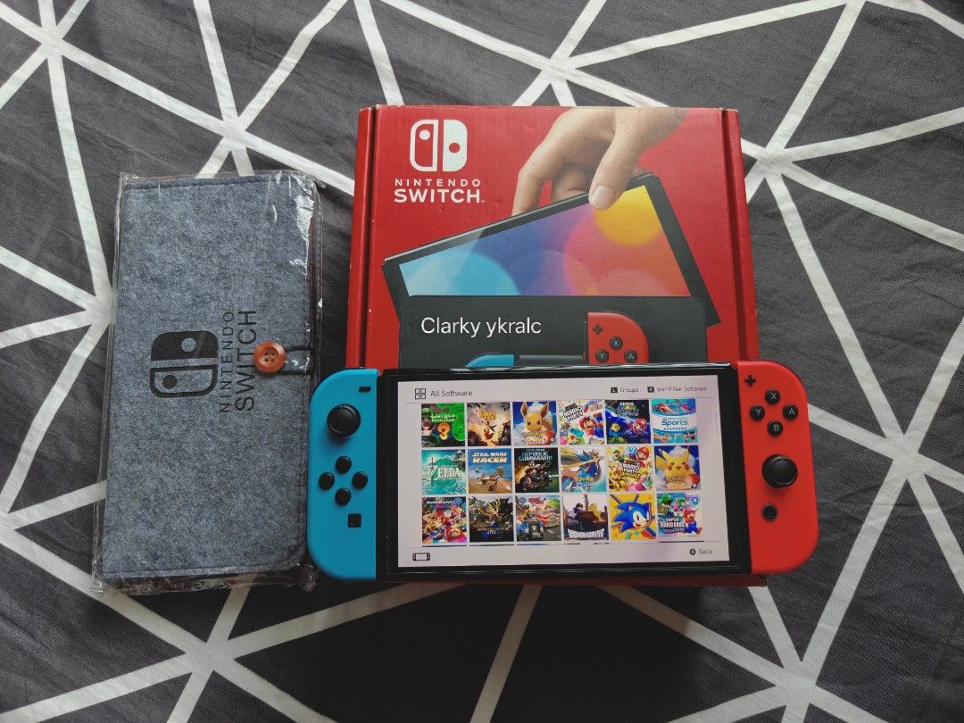Nintendo Switch Oled with Free Games (Category: Nintendo) located in Manila. Submitted by nswitchgear (Listing ID 1425111804, Image 2). Description: Nintendo Switch OLED with Free Games ₱10,999 FREE acess to my Paid games Legit purchase not Jailbreak. Used item but in Good/Best condition Can give 7 Days personal Warranty for peace of mind. -Doon po tayo sa kaya tayong issupport, dont settle for less. Comes w/ Complete Package w/ pouch (Box,charge