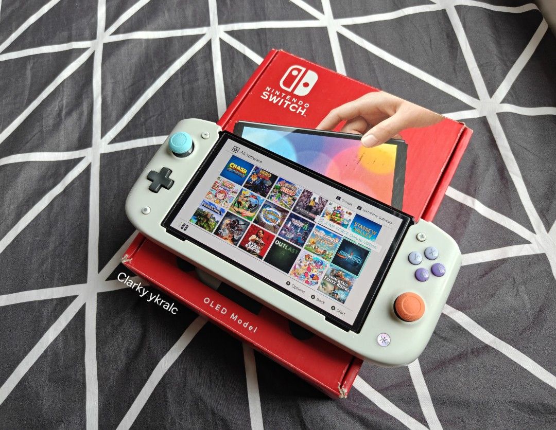 Nintendo Switch Oled with Free Games (Category: Nintendo) located in Manila. Submitted by nswitchgear (Listing ID 1425128675, Image 1). Description: Nintendo Switch OLED with Free Games ₱10,999 FREE acess to my Paid games Legit purchase not Jailbreak. Used item but in Good/Best condition Can give 7 Days personal Warranty for peace of mind. -Doon po tayo sa kaya tayong issupport, dont settle for less. Comes w/ Complete Package w/ pouch (Box,charge