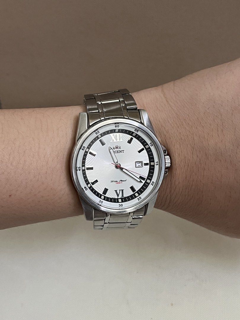 Orient sporty mens quartz (Category: Men's Watches) located in Cainta. Submitted by saminjess (Listing ID 1425099499, Image 2). Description: Orient sporty mens quartz 40mm diameter, 7.5" wrist size Watch only ₱6,000 Loc: cainta,rizal This is a pre-owned/vintage watch and may have signs of wear. Kindly manage your expectations. Cannot be returned once sold..