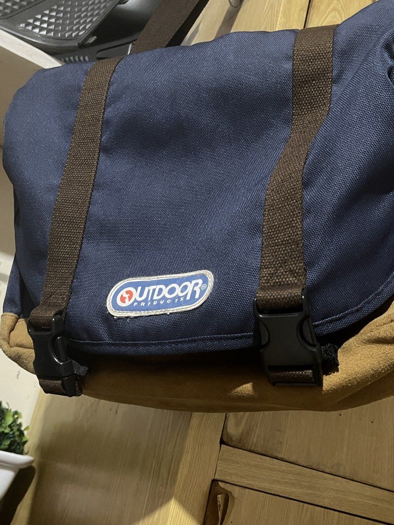 Outdoor Products Messenger Bag (Category: Sling Bags) located in Bulacan. Submitted by levidiff (Listing ID 1425210109, Image 2). Description: Outdoor Products Messenger Bag Navy blue and Brown Suede Working all zippers Adjustable shoulder strap Very good condition Check detailed pics.