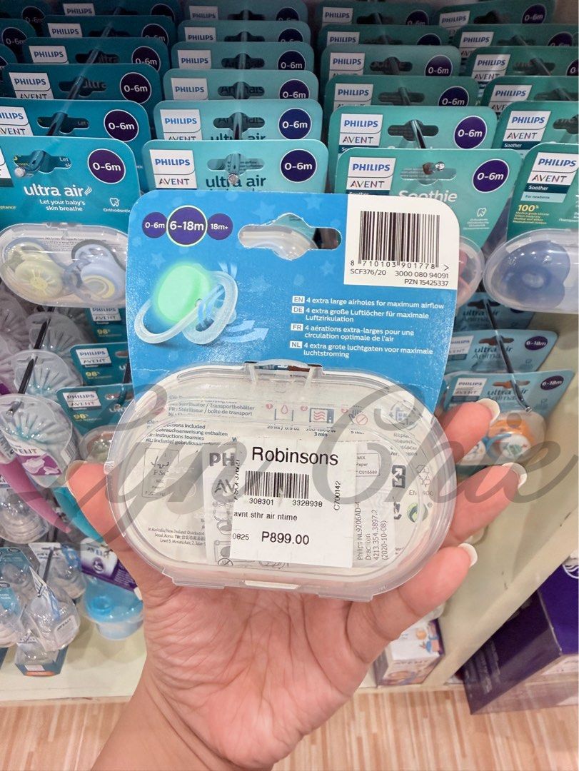 Philips Avent Ultra Air Nighttime Soother (Category: Soothers & Pacifiers) located in Las Pinas. Submitted by babyandmomstuffs (Listing ID 1425089447, Image 2). Description: Philips Avent Ultra Air Nighttime Soother for babies aged 6-18 months. Features glow-in-the-dark design for easy finding at night. Includes two pacifiers with extra airflow for maximum breathability. The product is new and sealed in its original packaging. Available also 0-6m