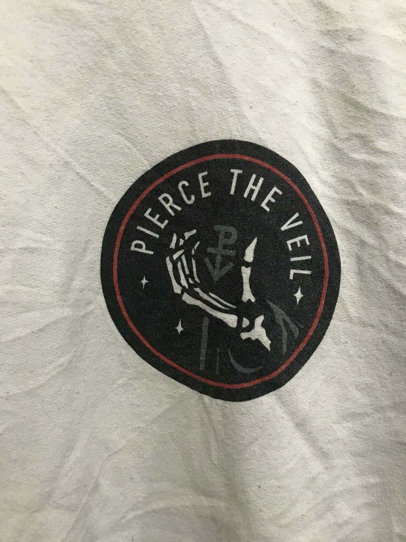 Pierce The Veil Graphic Sweatshirt (Category: Coats, Jackets and Outerwear) located in Cavite. Submitted by goofyasschigga (Listing ID 1425202999, Image 3). Description: Sweatshirt features a Pierce The Veil logo on the front and a graphic on the back that says "Don't Chase Your Nightmares". It is a crew neck style. The sweatshirt is white..