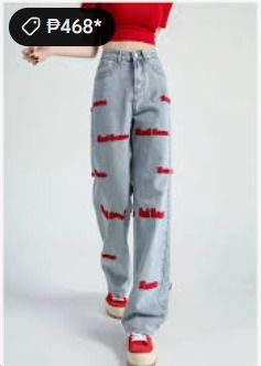 Red Embroidered Wide Leg Denim Jeans (Category: Jeans) located in Cavite. Submitted by cvshops (Listing ID 1425206599, Image 3). Description: 24-26 with belt slot Sobrang ganda ng fitting 39-40 length 399-450+ price online Light wash denim jeans with red embroidered text. Features a wide leg design. The jeans have a high waist and a classic style. The red embroidery is visible on the front and back of the jeans. These jeans are a stylish and comf