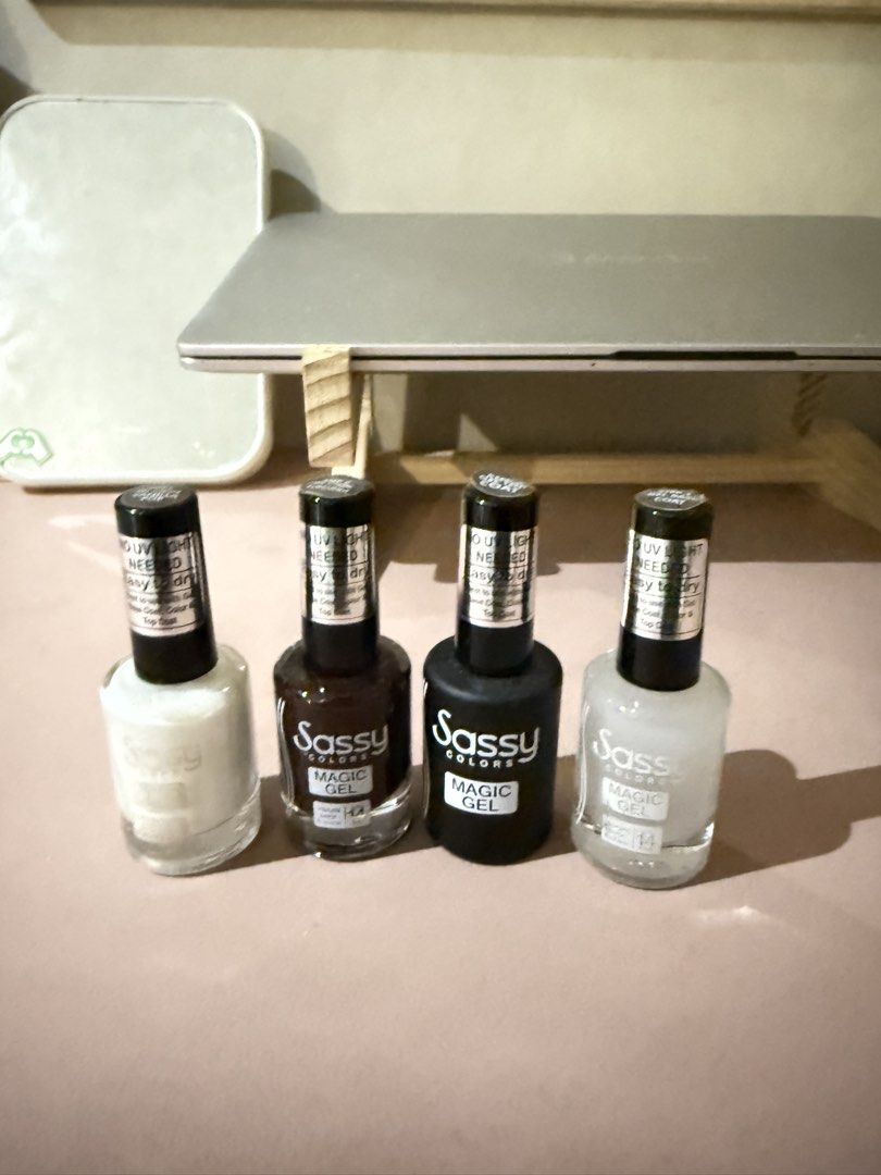 Sassy Colors Magic Gel Nail Polish Set (Category: Hands & Nails) located in Manila. Submitted by ab_jaede (Listing ID 1425171114, Image 1). Description: Set of four Sassy Colors Magic Gel nail polishes. Includes Vanilla Pop, Burgundy, Gel Top Coat, and Gel Base Coat..