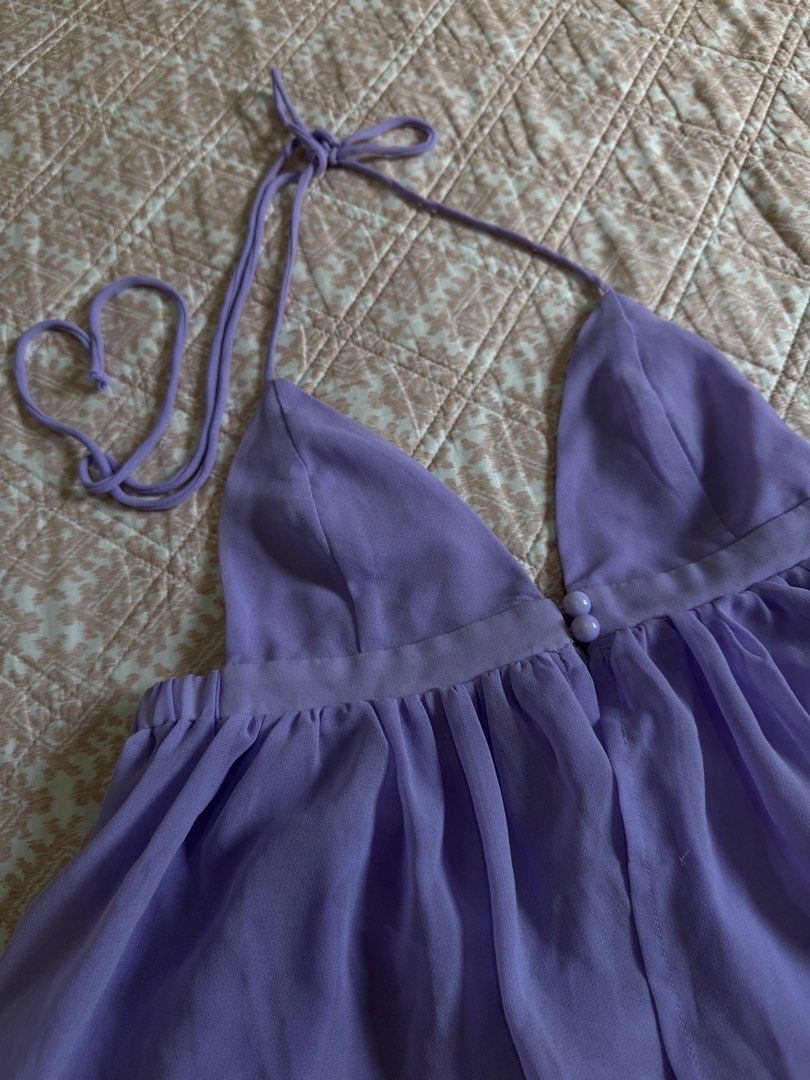 Shein Halter Top - XS (Category: Sleeveless) located in Manila. Submitted by andreaaarut2 (Listing ID 1425155391, Image 3). Description: - Shein Halter Top - Size: XS - Color: Lavender - Design: Flowy bottom - Condition: Excellent - Perfect for a chic and stylish look.