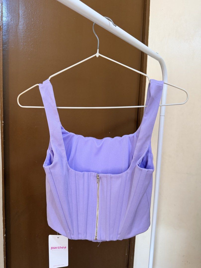 Shein Parthea Corset Top - Lavender (Category: Sleeveless) located in Mandaluyong City. Submitted by shinyjim (Listing ID 1425074597, Image 2). Description: 🎀Shein Parthea Purple Corset Top 🎀Zip Back with tag and boning 🎀XS on tag, up to 32 bust only.