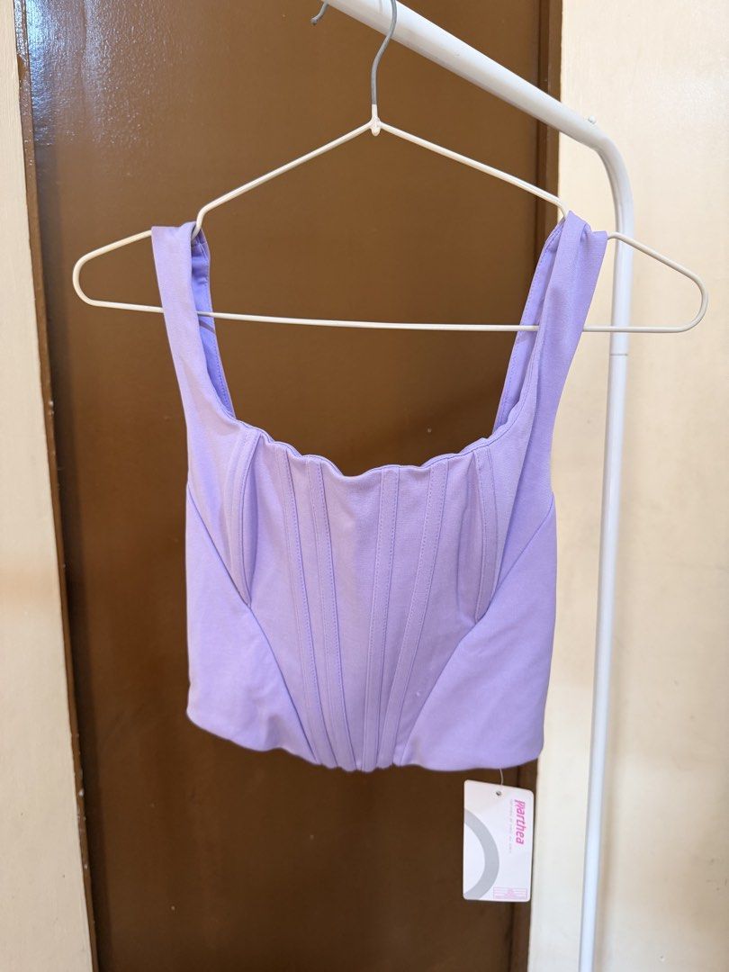 Shein Parthea Corset Top - Lavender (Category: Sleeveless) located in Mandaluyong City. Submitted by shinyjim (Listing ID 1425074597, Image 1). Description: 🎀Shein Parthea Purple Corset Top 🎀Zip Back with tag and boning 🎀XS on tag, up to 32 bust only.