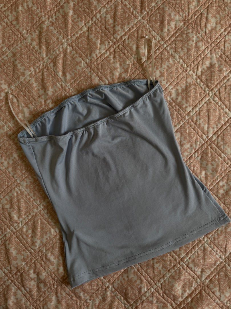 Shein Tube Top - Size S (Category: Others Tops) located in Manila. Submitted by andreaaarut2 (Listing ID 1425155393, Image 3). Description: - Shein tube top - Size S - Light blue color - Soft material - Perfect for casual wear.