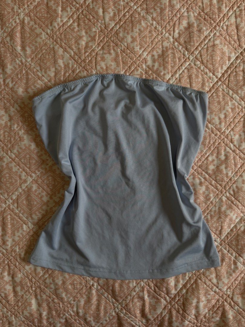 Shein Tube Top - Size S (Category: Others Tops) located in Manila. Submitted by andreaaarut2 (Listing ID 1425155393, Image 1). Description: - Shein tube top - Size S - Light blue color - Soft material - Perfect for casual wear.