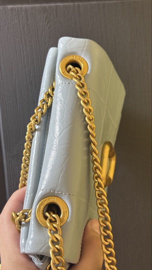 Songmont Quilted Shoulder Bag (Category: Luxury Bags & Wallets) located in Calamba. Submitted by ashvault (Listing ID 1425173184, Image 3). Description: Songmont Mini Chocolate Bag Placid Blue Like New no issue at all.