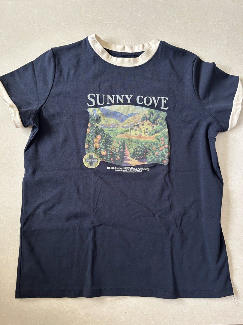 Sunny Cove Graphic Tee (Category: Shirts) located in Bacoor. Submitted by dm_preloved (Listing ID 1425063665, Image 1). Description: .