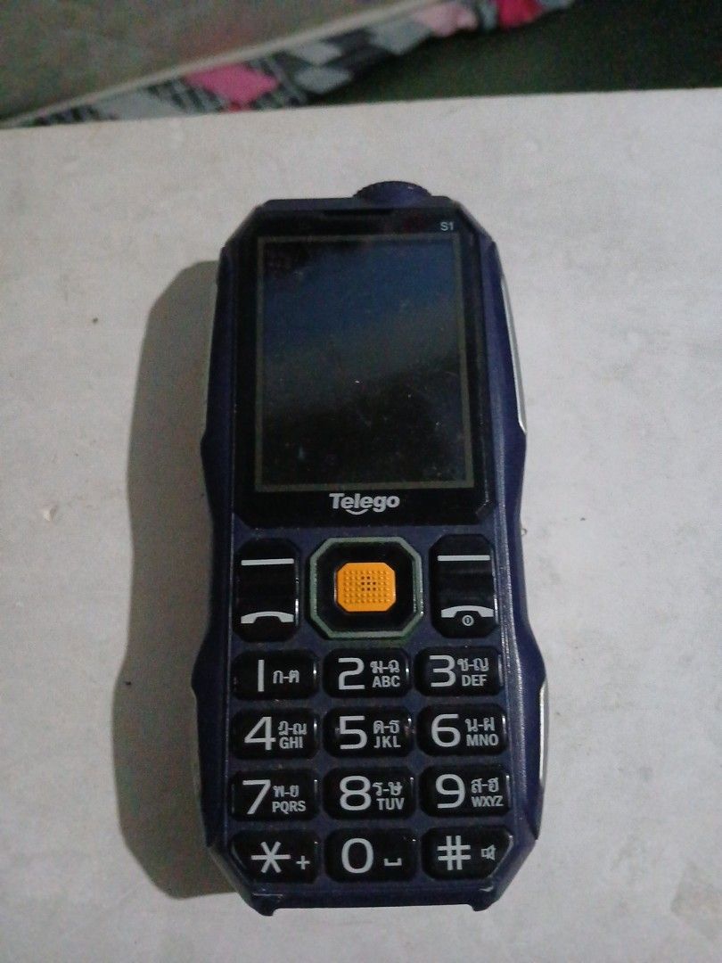 Telego Rugged Phone (Category: Android Others) located in Manila. Submitted by diczenestr94951 (Listing ID 1425161852, Image 1). Description: Rugged Telego phone features a built-in flashlight and a keypad. It has a USB port for charging and data transfer. The phone is dark blue in color..
