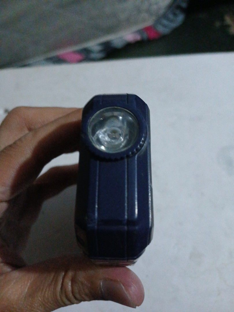 Telego Rugged Phone (Category: Android Others) located in Manila. Submitted by diczenestr94951 (Listing ID 1425161852, Image 3). Description: Rugged Telego phone features a built-in flashlight and a keypad. It has a USB port for charging and data transfer. The phone is dark blue in color..