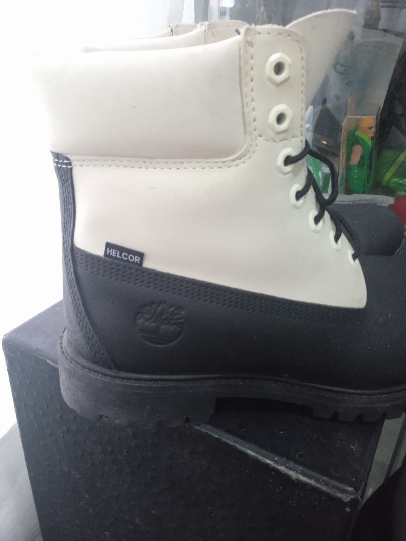 Timberland Black and White Boots (Category: Boots) located in Bacoor. Submitted by jasspapi6 (Listing ID 1425211376, Image 2). Description: Stylish Timberland boots in black and white. Features a classic lace-up design with a durable sole. The boots have a white upper and a black lower section. The Timberland logo is visible on the side. The boots appear to be well-maintained. Negotiable price Payment: Gcash or BDO Shipping: Grab, Lalamove or LBC