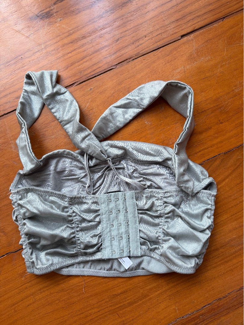 Urban Outfitters Silver Bra Top (Category: Sleeveless) located in Pasig City. Submitted by ninipoonini (Listing ID 1425091084, Image 3). Description: ‼️ 5% off if you buy 2+ items (max: P300 off) ‼️ - Soo cute so sad to give this away - Ubran Outfitters (Out from Under) - Size small .