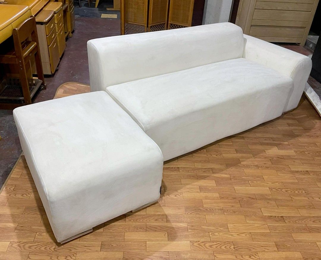 White Modern Sofa with Ottoman (Category: Sofas) located in Manila. Submitted by wiseocean.25b393 (Listing ID 1425080494, Image 3). Description: Stylish white sofa set with an ottoman. The sofa has a modern design with clean lines and a comfortable appearance. The ottoman can be used as a footrest or extra seating. Dimensions are approximately: Height 17/27 inches, Length 91 inches, Width 34 inches. Perfect for living rooms or lounges..