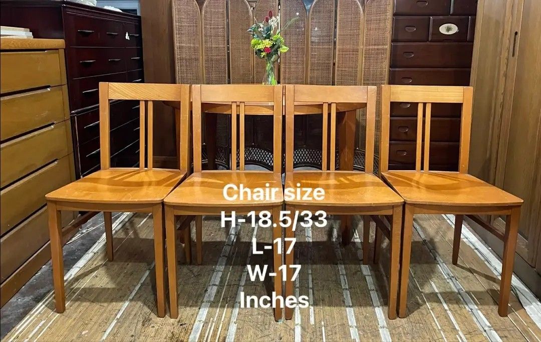 Wooden Dining Table and Chairs Set (Category: Tables & Sets) located in Manila. Submitted by wiseocean.25b393 (Listing ID 1425082314, Image 2). Description: Dining set includes a round wooden table and four chairs. The table is 29 inches high and 47 inches in diameter. The chairs are 18.5/33 inches high, 17 inches long, and 17 inches wide. The set is made of wood and has a warm, natural finish. Perfect for a small dining area or kitchen..