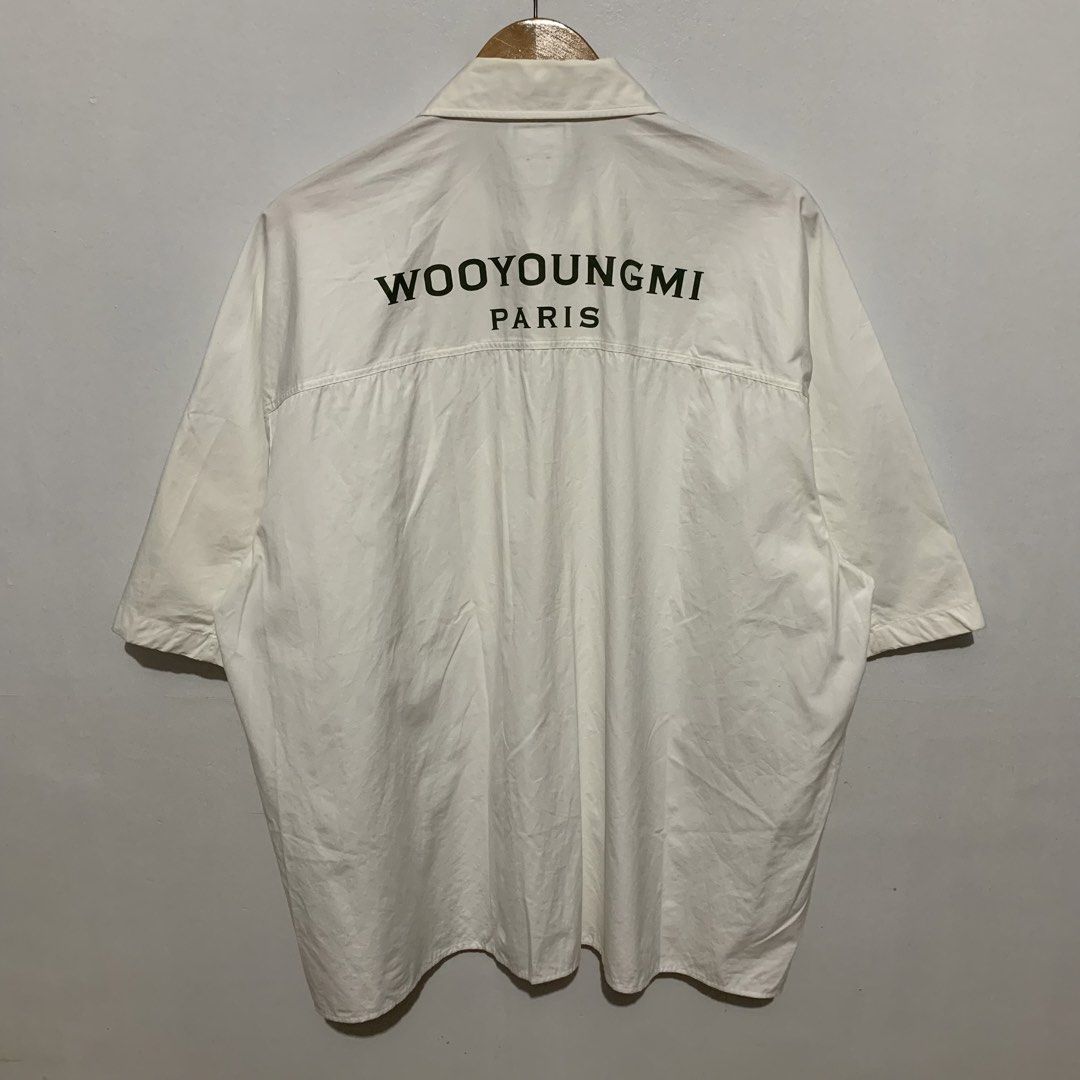 WOOYOUNGMI Paris SS21 Oversized Button Shirt (Category: Formal Shirts) located in Quezon. Submitted by 4301Garms (Listing ID 1425229947, Image 2). Description: WOOYOUNGMI Paris SS21 Oversized Button Shirt Size 52 Width 27.5" Length 29" 9/10 condition Flaws: missing emblem at back part 800.