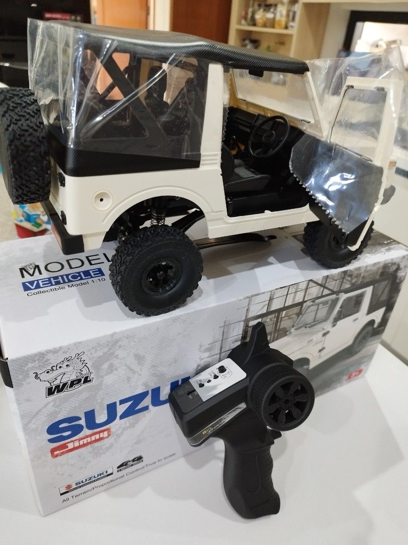 WPL Suzuki Jimny 4x4 RC Car (Category: Remote Control Toys) located in Marikina City. Submitted by fiercebird_45e48d (Listing ID 1425205993, Image 2). Description: Suzuki Jimny RC Car 1:10 scale model WPL-C74-1 "Naughty Dragon" Meet up only: Antipolo area..