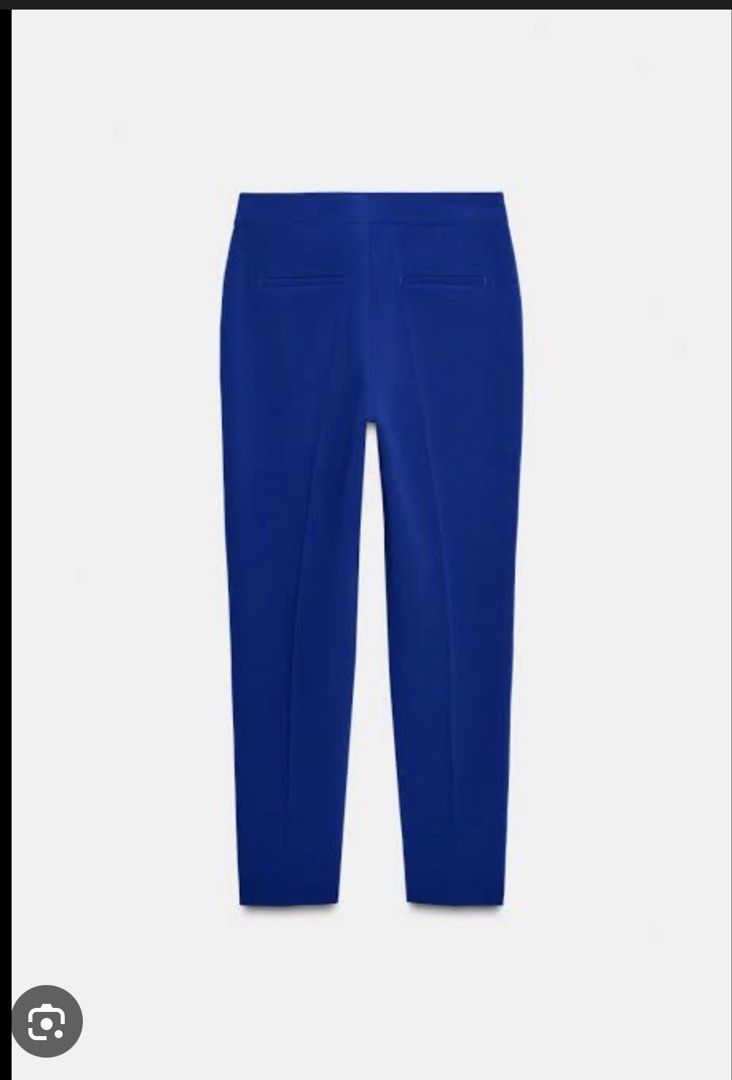 Zara Blue Trousers - Size S (Category: Other Bottoms) located in Quezon City. Submitted by twinklestyle (Listing ID 1425216861, Image 1). Description: Zara blue trousers. Features a tailored design with a straight leg cut. Includes a back pocket and a tag indicating the size is S. The trousers are a vibrant blue color, suitable for various occasions. The style is modern and versatile, perfect for creating a polished look. Brand new with tag Selli