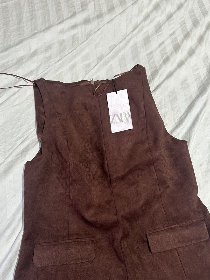 Zara brown suede top (Category: Sleeveless) located in Quezon City. Submitted by celoem (Listing ID 1425145352, Image 3). Description: BNWT. Originally priced at 2395 No when worn photos This is authentic, not from the orange app 😊 M on tag but best fits size S. Willing to trade it for a size L.