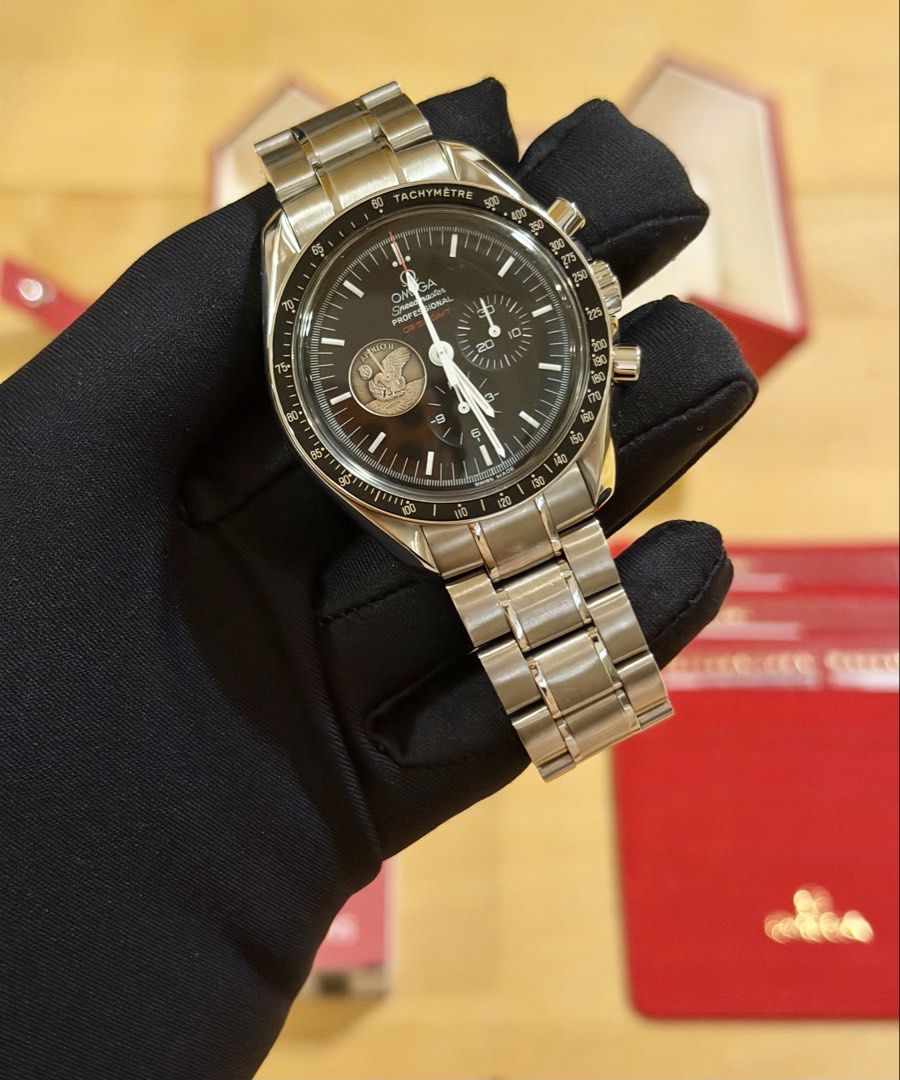 2009 Omega Speedmaster Apollo 11 Moonwatch (Category: Luxury Watches) located in Makati City. Submitted by timefocusph (Listing ID 1425428746, Image 3). Description: For sale: 2009 Omega Speedmaster Moonwatch Apollo 11 40th Anniversary • Ref. 311.30.42.30.01.002 • 42mm case diameter • Hesalite crystal, manual winding • Omega service pouch, cards, and booklet • 9.5/10 condition • Only 7969 pcs produced • Lucky 777 serial number Selling this for ₱3