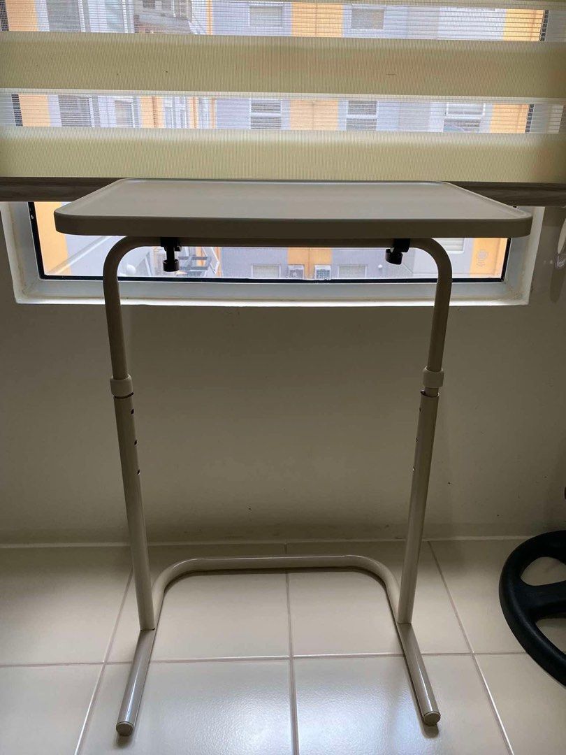 Adjustable Laptop Table (Category: Tables & Sets) located in Davao. Submitted by snapish77 (Listing ID 1425403555, Image 2). Description: Adjustable height / foldable bedside table. Can be used for working. Without glass holder. Loc: Brgy. Rosario, Pasig City Bought for Php 850. Like new..