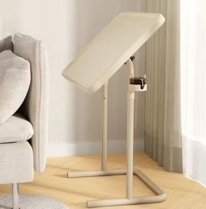 Adjustable Laptop Table (Category: Tables & Sets) located in Davao. Submitted by snapish77 (Listing ID 1425403555, Image 3). Description: Adjustable height / foldable bedside table. Can be used for working. Without glass holder. Loc: Brgy. Rosario, Pasig City Bought for Php 850. Like new..