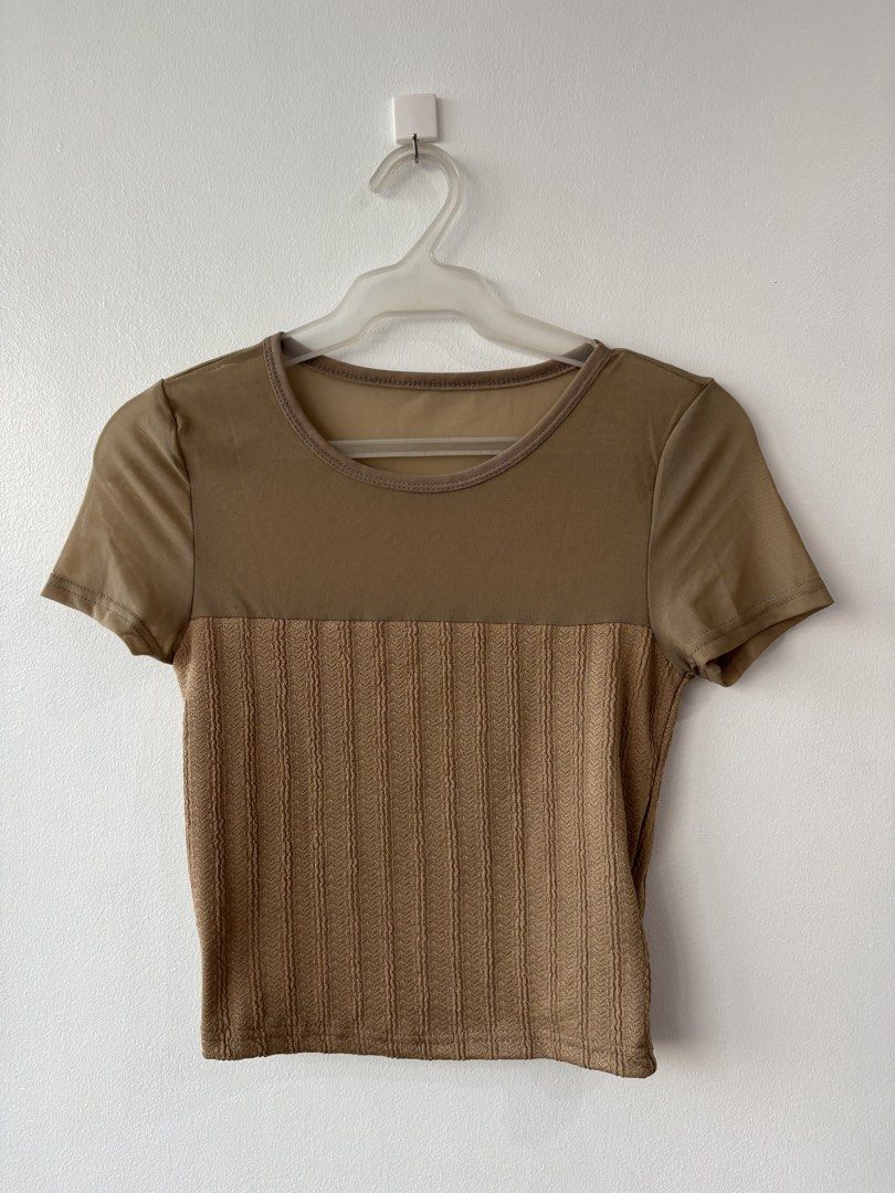 Brown Crop Top (Category: Others Tops) located in Mandaluyong City. Submitted by julsang (Listing ID 1425294219, Image 1). Description: - Brand new 🤎🤍 - slim fit, short sleeve with net yarn patchwork - size: Medium - Crop top - Sheer contrast mesh ruched - Round neck short sleeve slim fit - Highly stretchable.