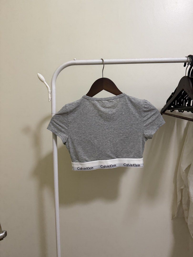 Calvin Klein Bralette Crop Top in Grey Medium (Category: Others Tops) located in Pasig City. Submitted by prelovederis (Listing ID 1425359804, Image 3). Description: Unused w/ small unnoticeable hole (see the photo) factory defect po.