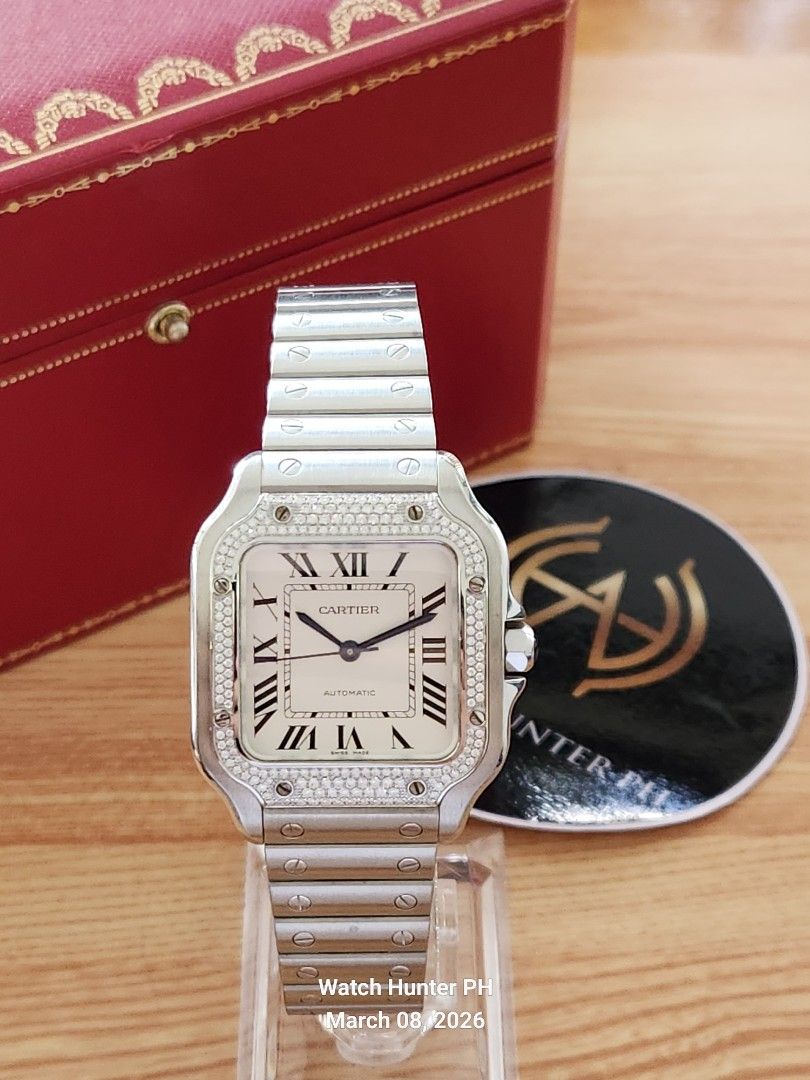 Cartier Santos De Cartier Automatic Watch (Category: Luxury Watches) located in Muntinlupa City. Submitted by watch.hunter.ph (Listing ID 1425334758, Image 1). Description: Cartier Santos Medium Factory Diamonds DOP : 2021. Warranty until 2029 W4SA0005 Full set. Box Card Watch Open for Authentication Meetup for sure buyers DM for inquiries..