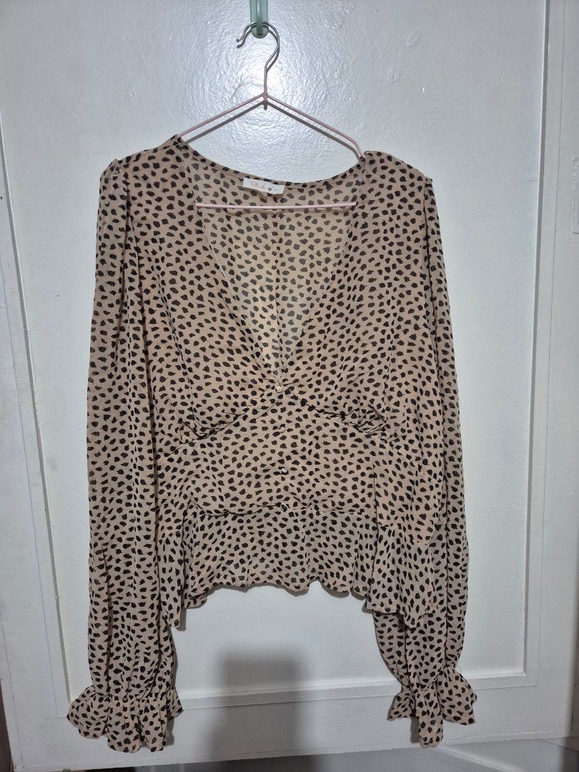 Cheetah Print Blouse (Category: Blouses) located in Quezon City. Submitted by conchicken (Listing ID 1425422282, Image 1). Description: never worn large xl.