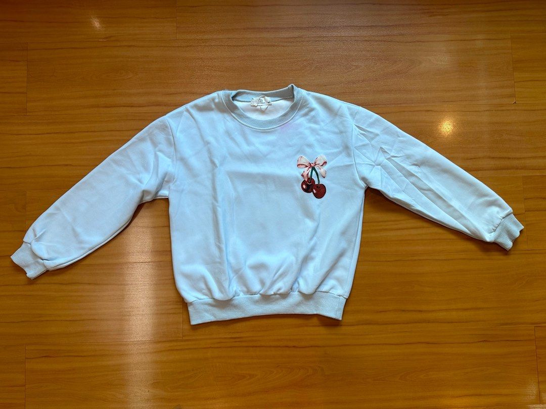 Cherry Print Sweatshirt and Skort Set (Category: Sets or Coordinates) located in San Juan City. Submitted by porygon (Listing ID 1425303514, Image 2). Description: Sweater: - Light blue sweater - Small cherry detail in front - Big cherry detail in the back - Good for size small - medium - Baggy and cropped fit - Has a purple stain in the collar - Worn once or twice Skort: - Has pockets - flare design - Shorts underneath - Never worn Separate pric