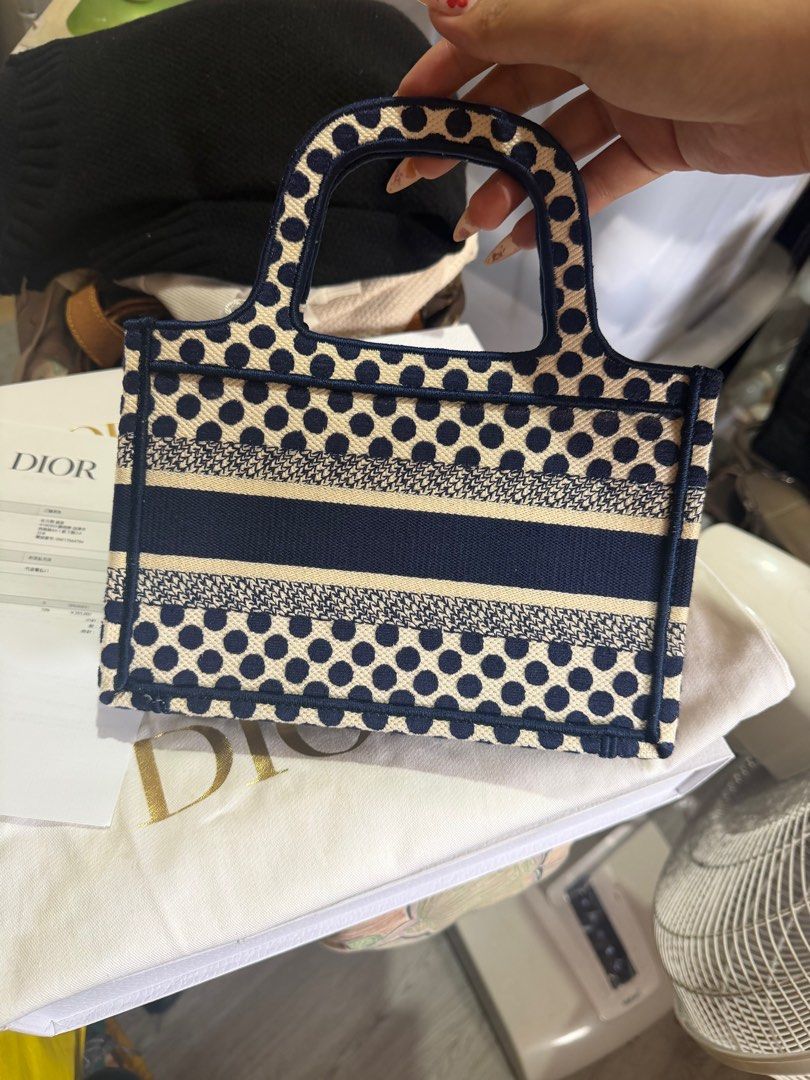 Christian Dior Mini Book Tote Bag (Category: Luxury Bags & Wallets) located in Quezon City. Submitted by jadejoaquin16 (Listing ID 1425296989, Image 3). Description: Christian Dior DiorAmour Book Tote Printed Canvas Mini Blue BRAND NEW COMPLETE .