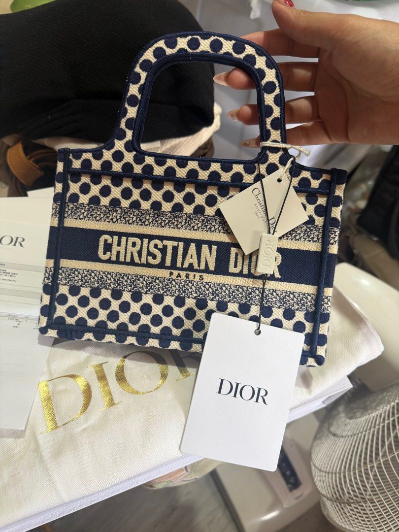 Christian Dior Mini Book Tote Bag (Category: Luxury Bags & Wallets) located in Quezon City. Submitted by jadejoaquin16 (Listing ID 1425296989, Image 2). Description: Christian Dior DiorAmour Book Tote Printed Canvas Mini Blue BRAND NEW COMPLETE .