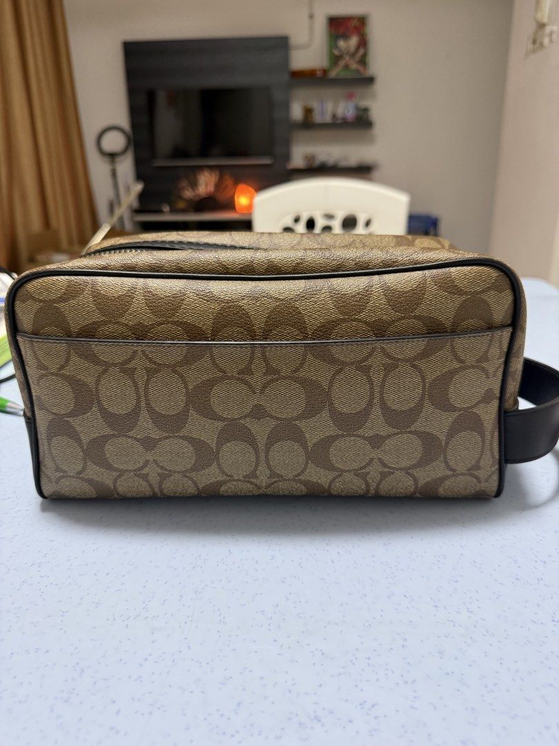 Coach Signature Toiletry Bag (Category: Luxury Bags & Wallets) located in Pasay City. Submitted by JusDeLux (Listing ID 1425430408, Image 2). Description: 💯 authentic .