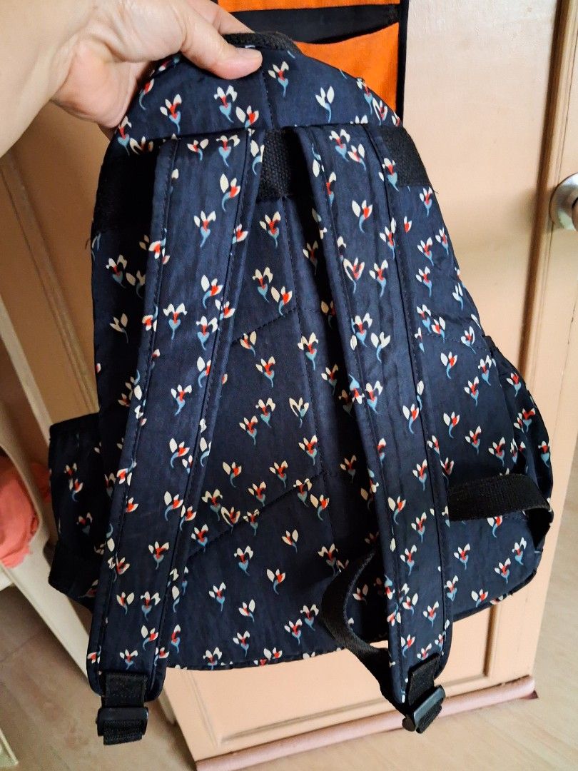 Eligator Floral Backpack (Category: Backpacks) located in Angeles City. Submitted by anneps (Listing ID 1425302898, Image 2). Description: - Eligator backpack - Navy blue with floral pattern - Zippered main compartment - Front pocket - Top handle - Adjustable shoulder straps - Eligator logo visible - fr Korea.