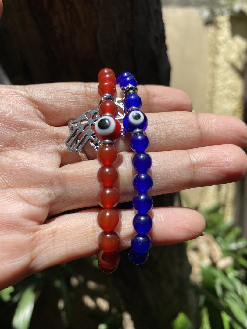 Evil Eye stone Bracelets with Hamsa Charm (Category: Bracelets) located in General Trias. Submitted by artycles (Listing ID 1425291103, Image 2). Description: Evil Eye 7mm round or 10mm flat Stainless steel spacers Stones available: Blue quartz Red Carnelian Black Onyx Pm lang po sa wrist size.