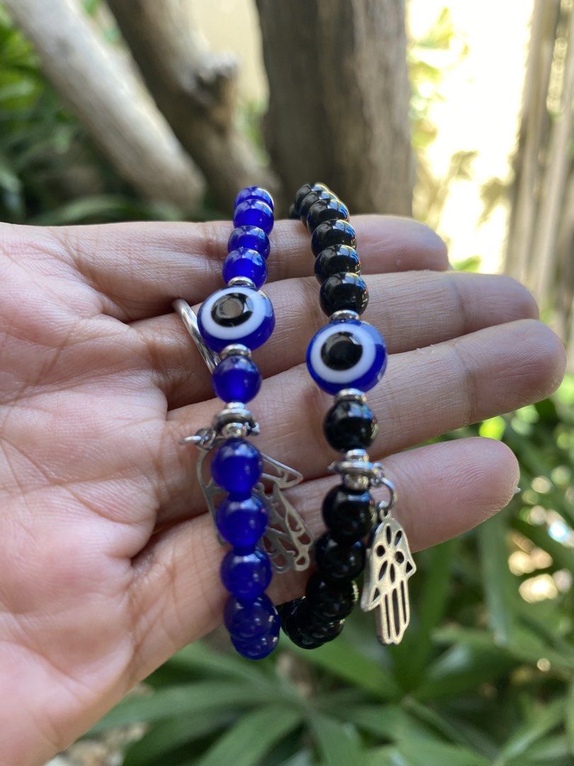 Evil Eye stone Bracelets with Hamsa Charm (Category: Bracelets) located in General Trias. Submitted by artycles (Listing ID 1425291103, Image 1). Description: Evil Eye 7mm round or 10mm flat Stainless steel spacers Stones available: Blue quartz Red Carnelian Black Onyx Pm lang po sa wrist size.