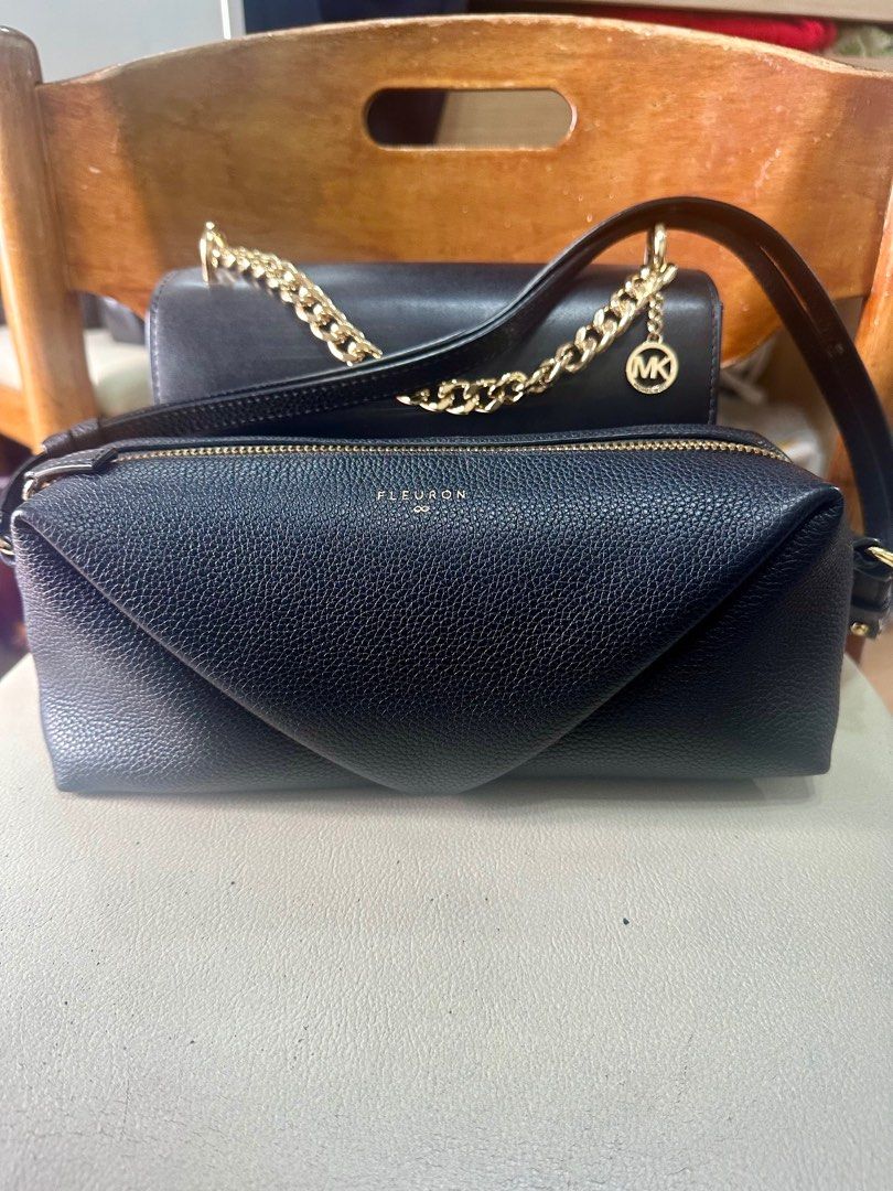 Fleuron Trinity Bag Noir (Black) (Category: Luxury Bags & Wallets) located in Quezon City. Submitted by qeilahh (Listing ID 1425281596, Image 2). Description: Full-grain calfskin leather exterior Beige microsuede lining 1 interior patch pocket Zip closure Gold-tone hardware Adjustable strap (about 60–100 cm) so it can be worn shoulder, short crossbody, or clutch..
