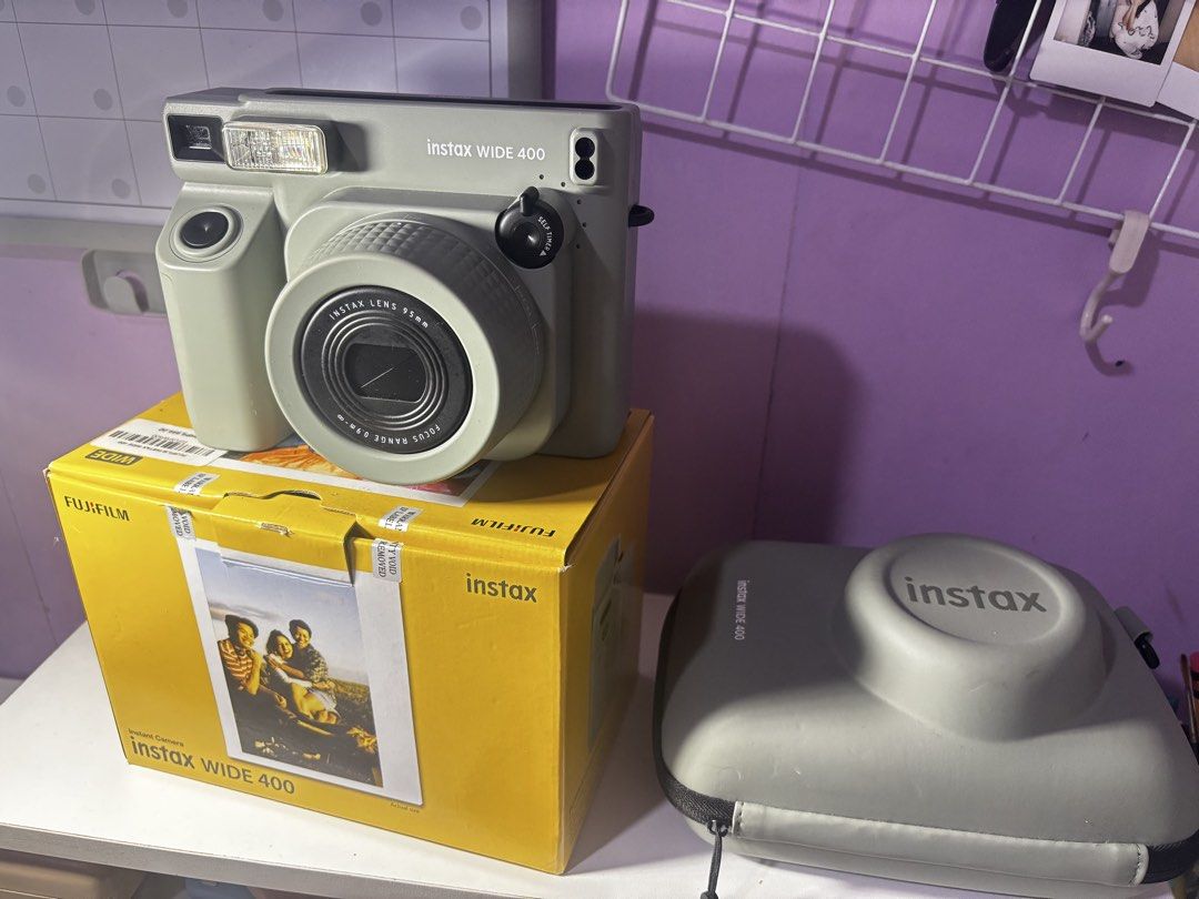 Fujifilm Instax Wide 400 Instant Camera (Category: Cameras) located in Paranaque City. Submitted by jsphine (Listing ID 1425309853, Image 1). Description: Inclusions: - camera - box - case - with 1 film to tes Rfs: planning to switch to a smaller one.