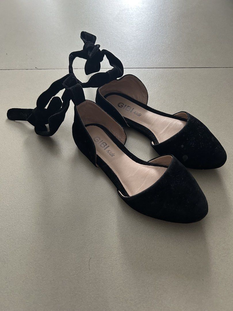 Gibi Kids Black Flats with Ankle Strap Size 25 (Category: Babies & Kids Fashion) located in Quezon City. Submitted by pnmpreloved (Listing ID 1425314517, Image 2). Description: • Worn only x3; good condition; needs cleaning; small scuff on back left heel, but not immediately visible (see photo) • Suede/velvet material • Size 25 • 100% authentic, no available box .